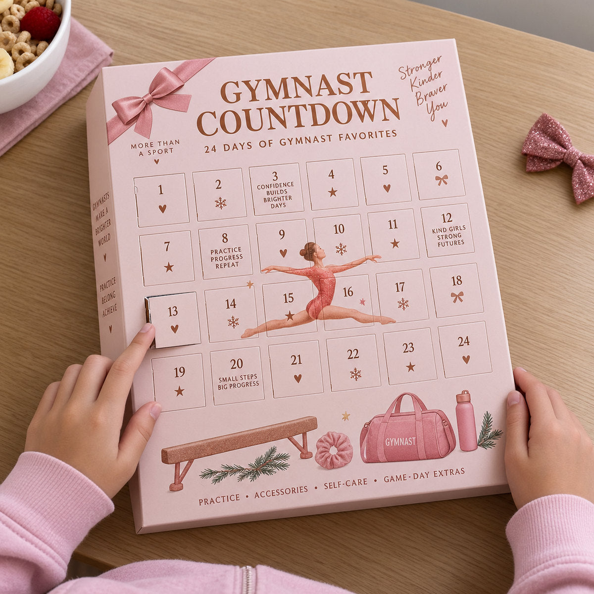 A gymnast's hands opening door 1 of the Gymnast Countdown calendar at the kitchen table