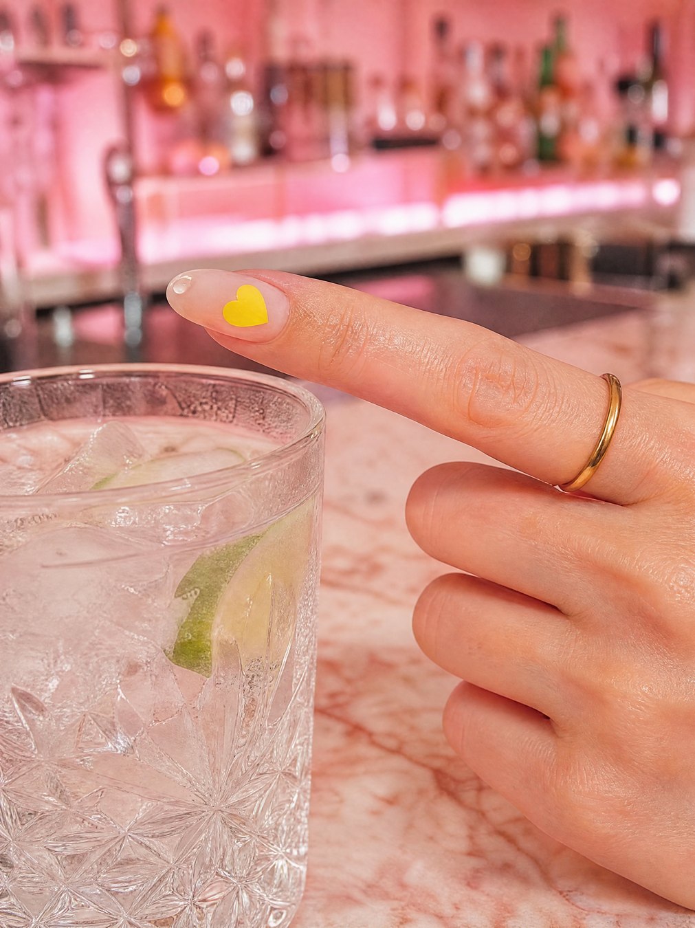 The heart sticker still bright yellow after testing the drink