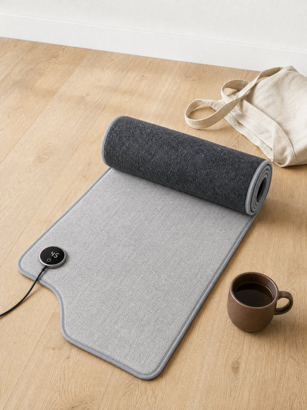 The leg heater opened flat and rolled up next to a tote bag